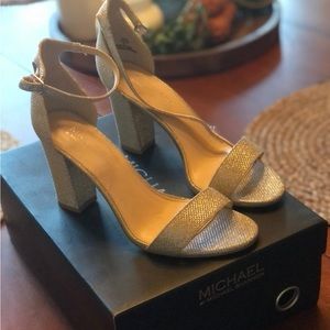 Beautiful women’s silver dress shoes worn one time for wedding